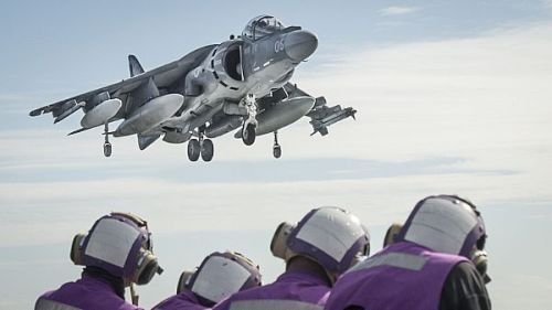 190115-M-EC058-0160 PACIFIC OCEAN (Jan. 15, 2019) An AV-8B harrier attached to Marine Medium Tiltrotor Squadron (VMM) 163, 11th Marine Expeditionary Unit (MEU), prepares to land aboard the amphibious assault ship USS Boxer (LHD 4). The Marines and Sailors of the 11th MEU are conducting routine operations as a part of the Boxer Amphibious Ready Group (ARG) in the eastern Pacific Ocean. (U.S. Marine Corps photo by Lance Cpl. Dalton S. Swanbeck/Released)